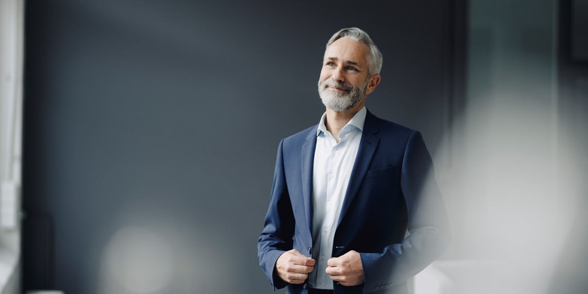 man in suit smiling