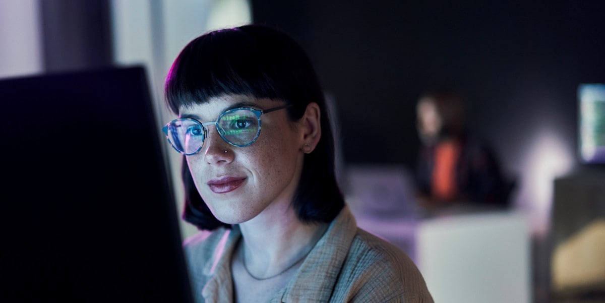 woman looking at computer screen